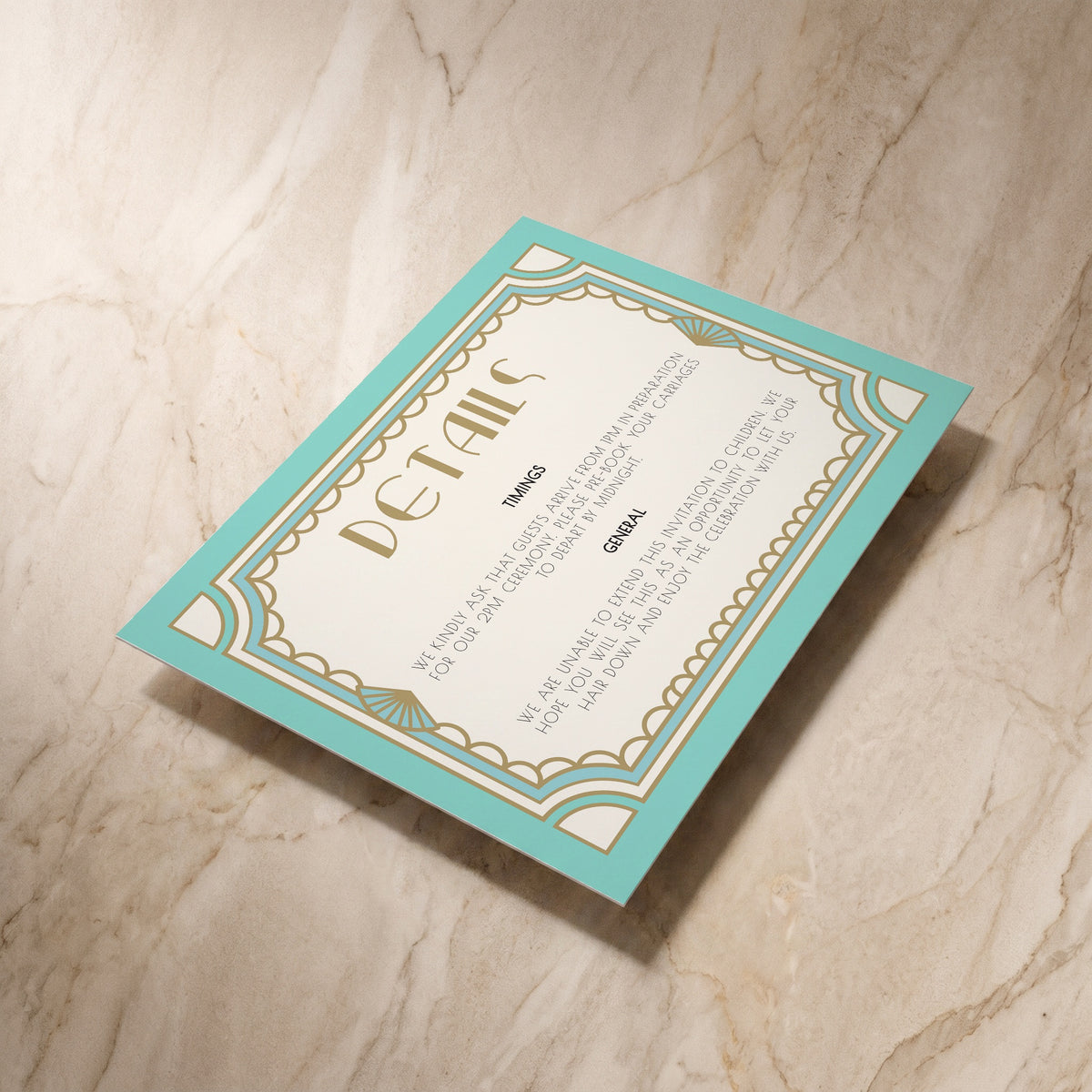 Art Deco wedding details card, shown at an angle, designed and printed in Suffolk