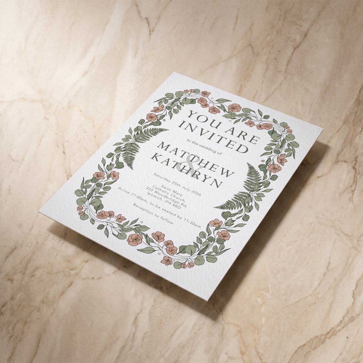 Country Garden wedding invitation, shown at an angle, designed and printed in Suffolk