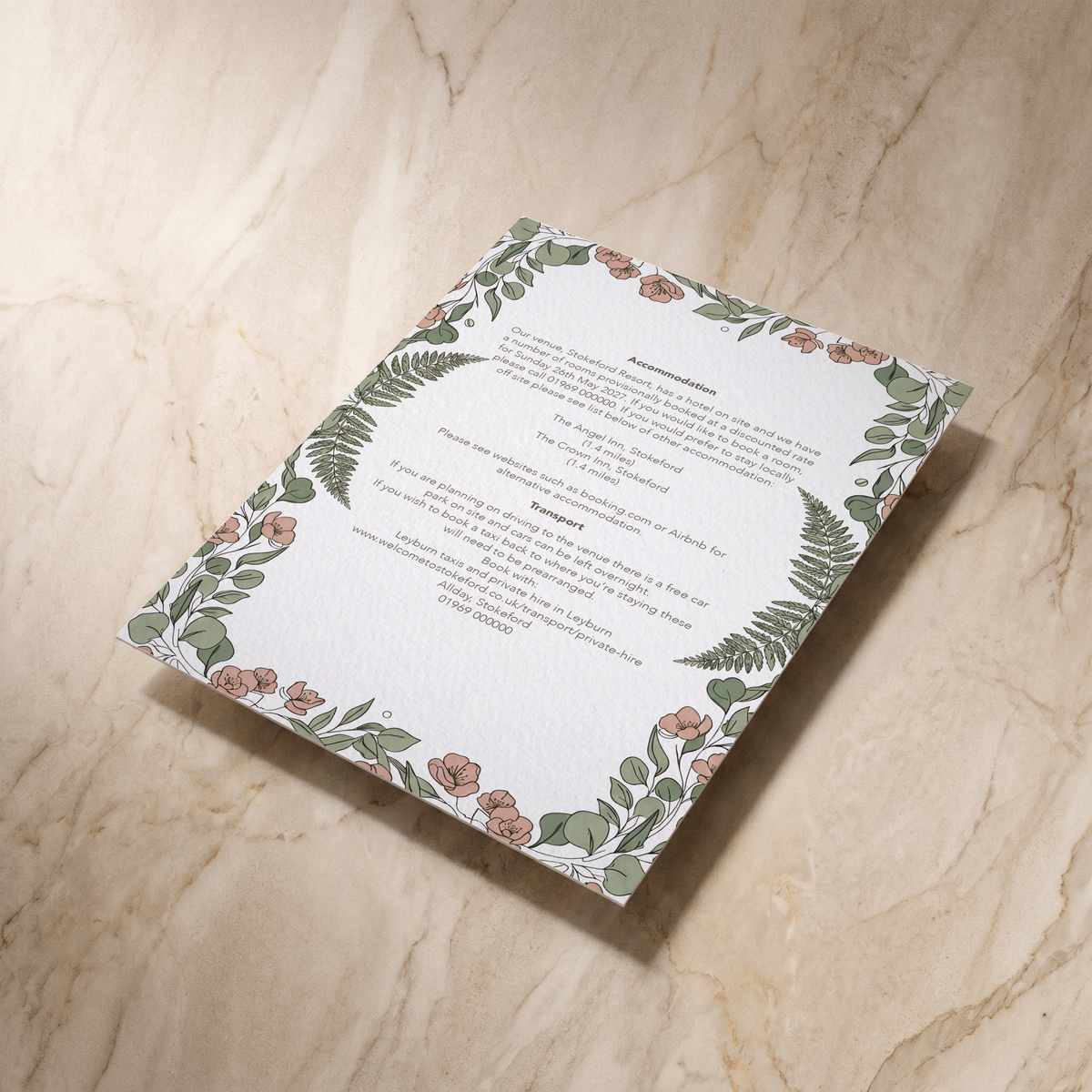Country Garden wedding details card, reverse shown at an angle, designed and printed in Suffolk