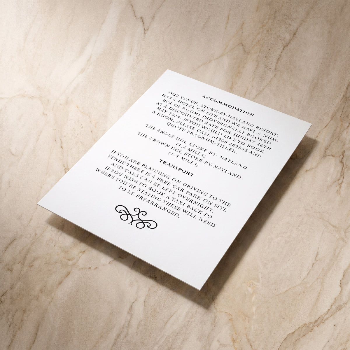 Essential wedding details card, reverse shown at an angle, designed and printed in Suffolk
