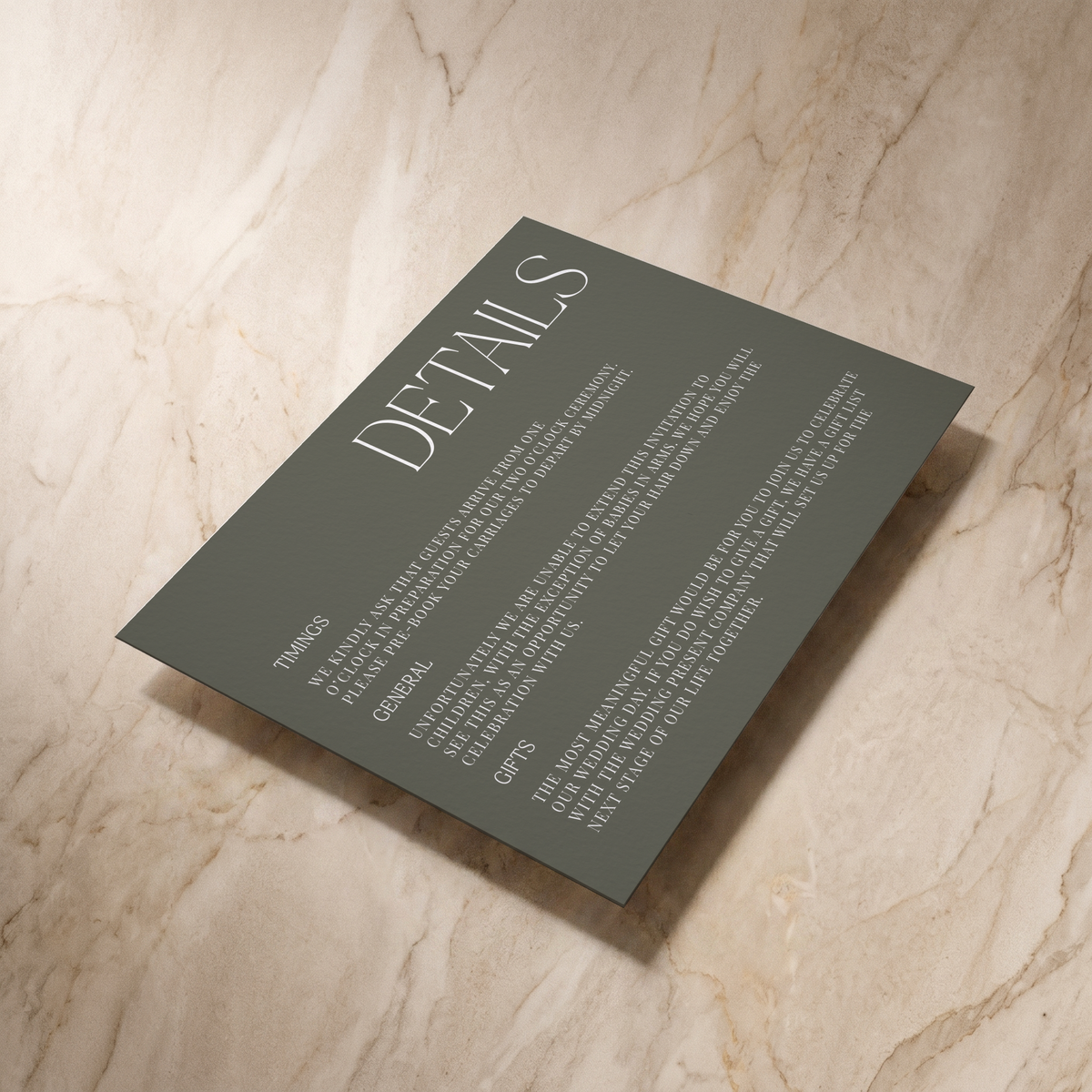 Typeface wedding details card in forest green, shown at an angle, designed and printed in Suffolk