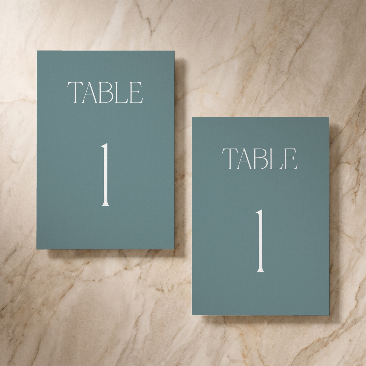 Typeface table number card in powder blue, front and reverse, designed and printed in Suffolk