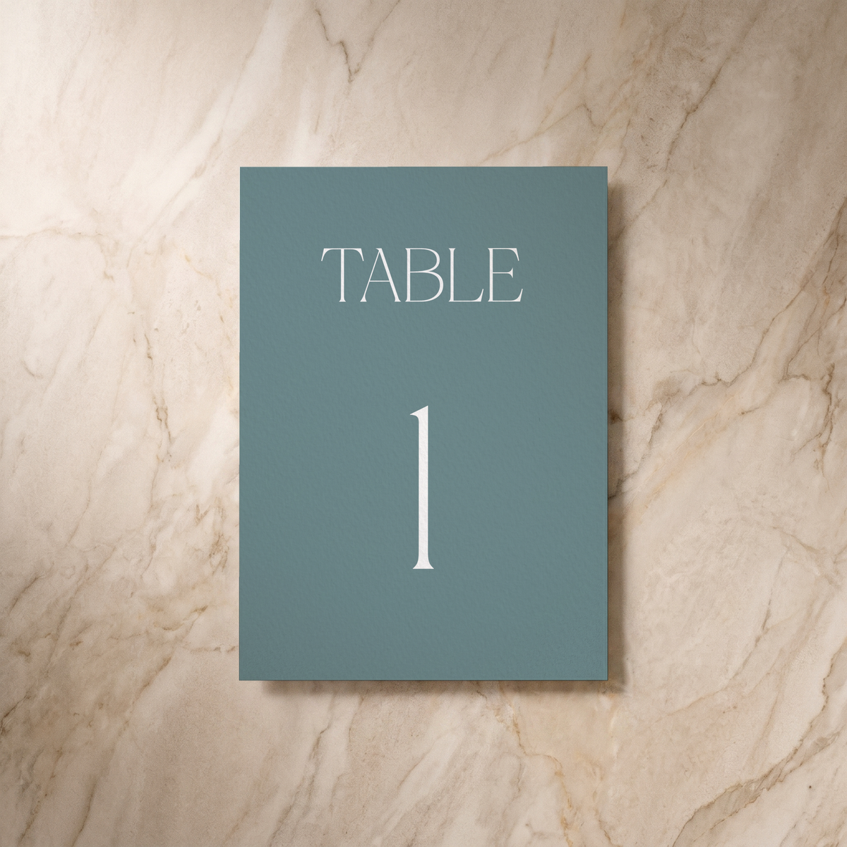 Typeface table number card in powder blue, front design, designed and printed in Suffolk