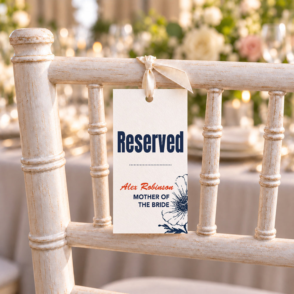 Illustrative wedding reserved tag tied to a chair back